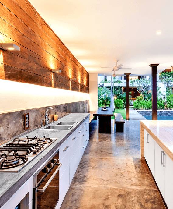 Modern Outdoor patio with natural stone wall and flooring