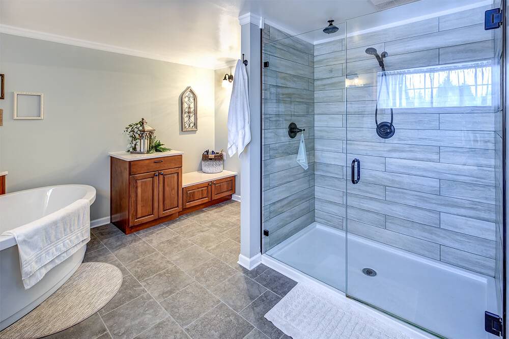 Walk in shower with wood tile